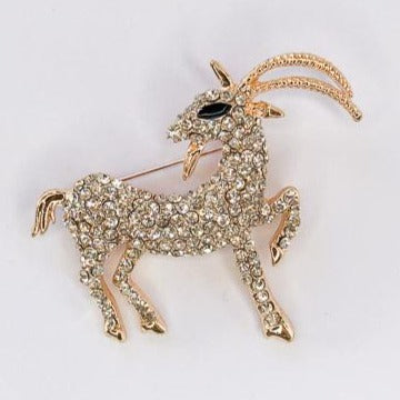 gold and diamante goat with black enamel eye brooch at erika