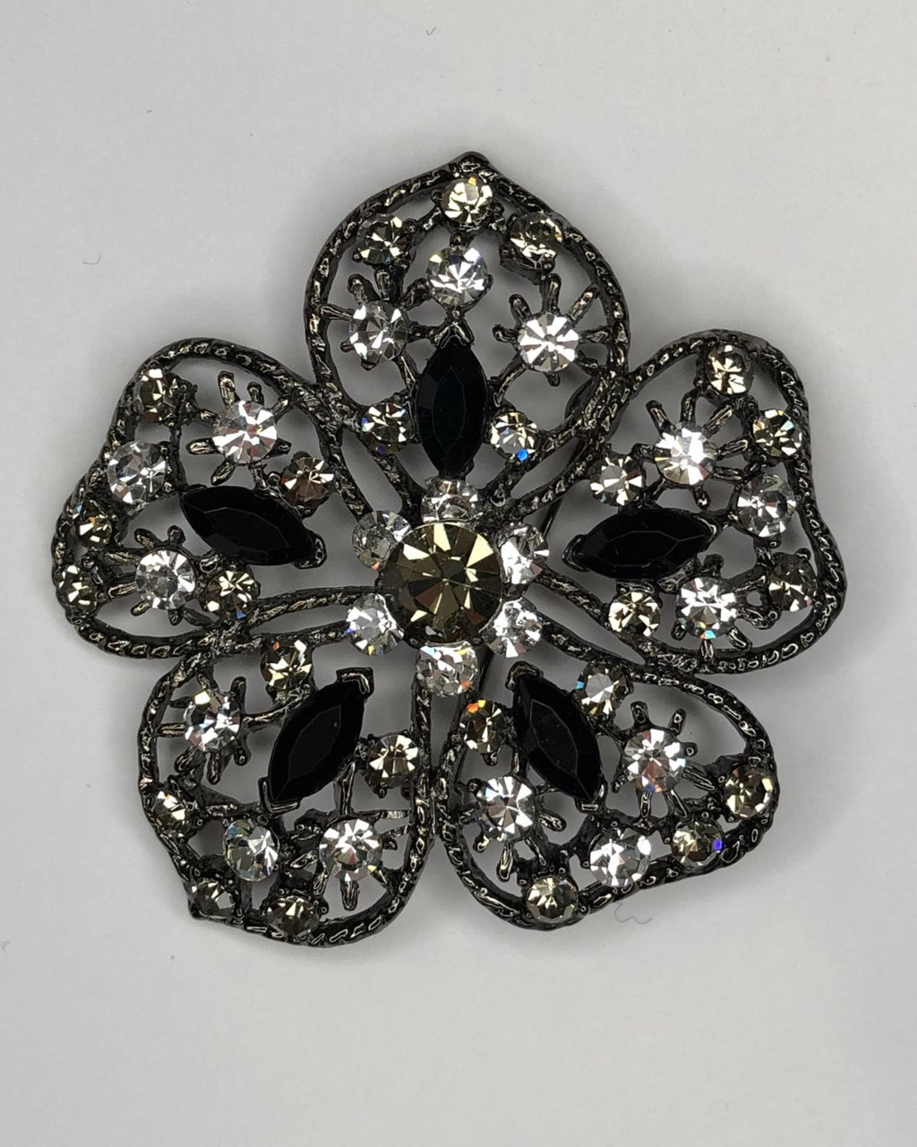 Large black & crystal flower brooch at erika