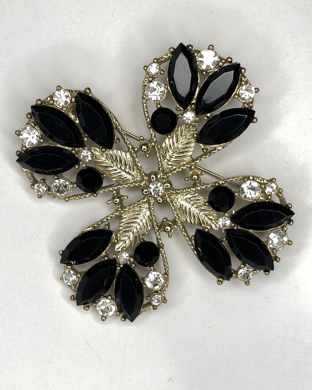 Gold & black 4-leaf clover design brooch at erika