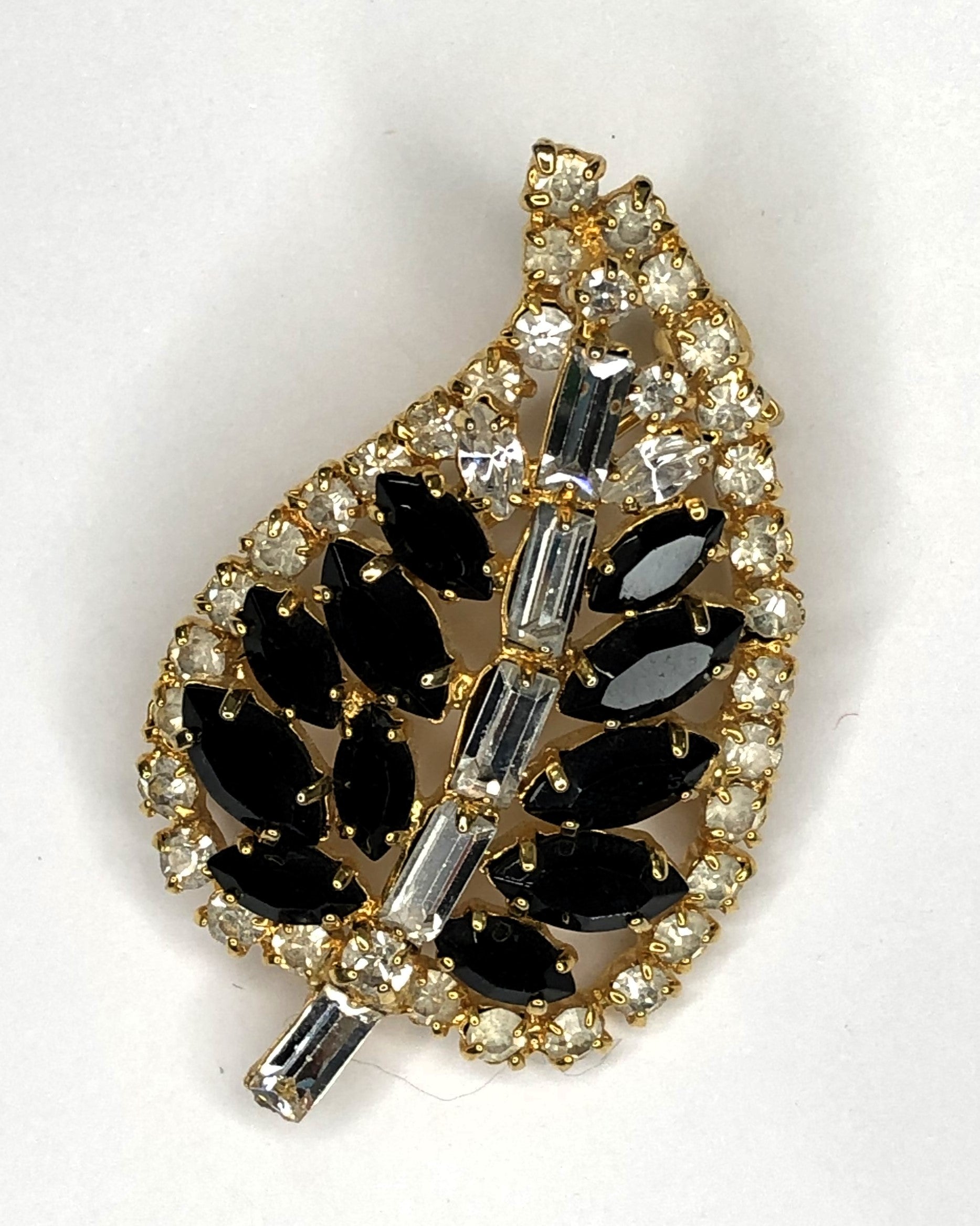 Gold & black crystal leaf brooch at erika
