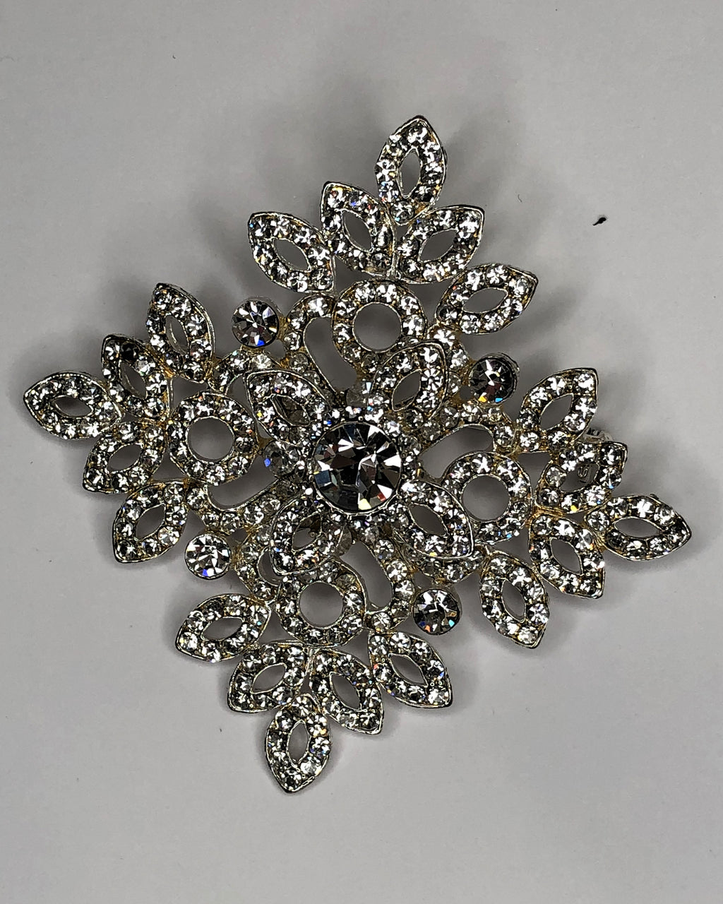 Large diamante encrusted snowflake brooch at erika