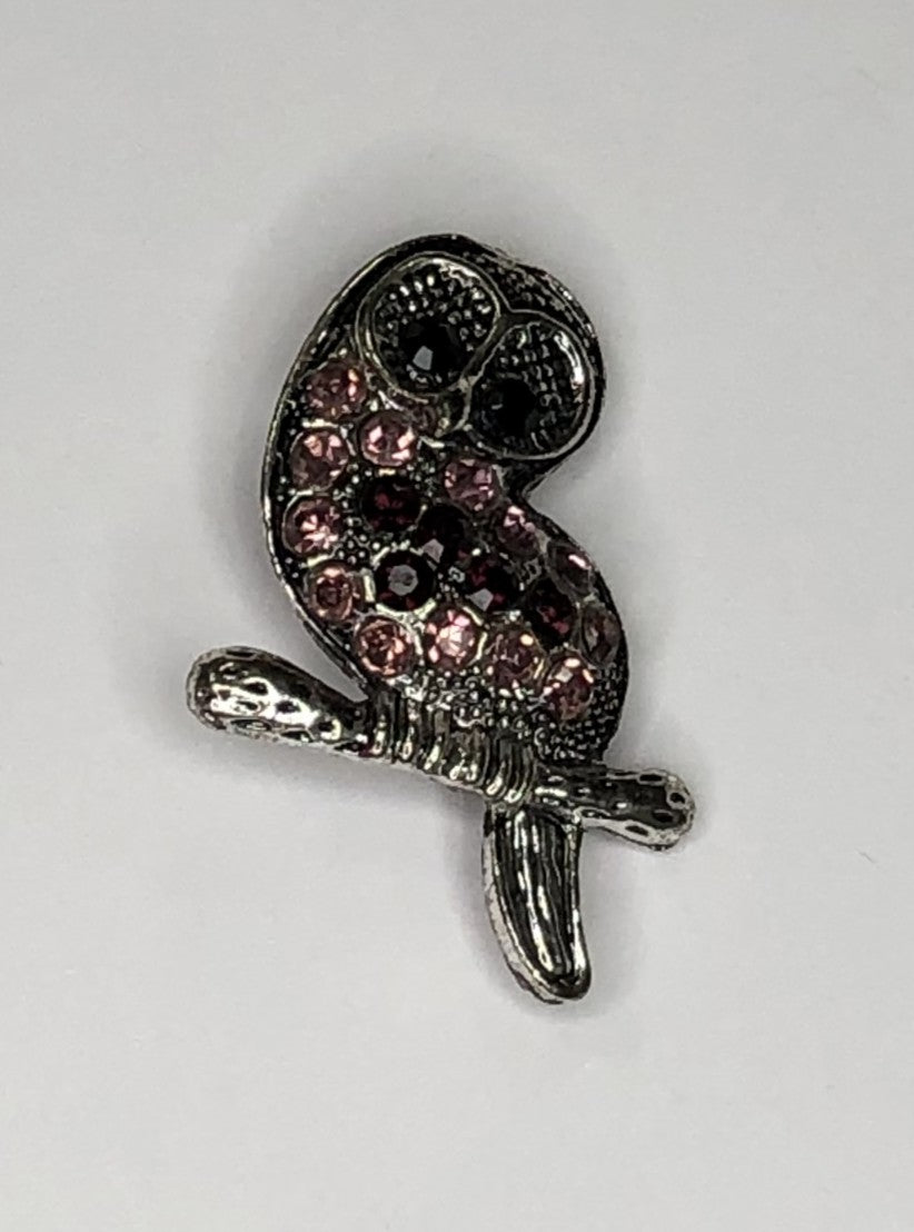 Silver owl with amethyst crystal body brooch at erika