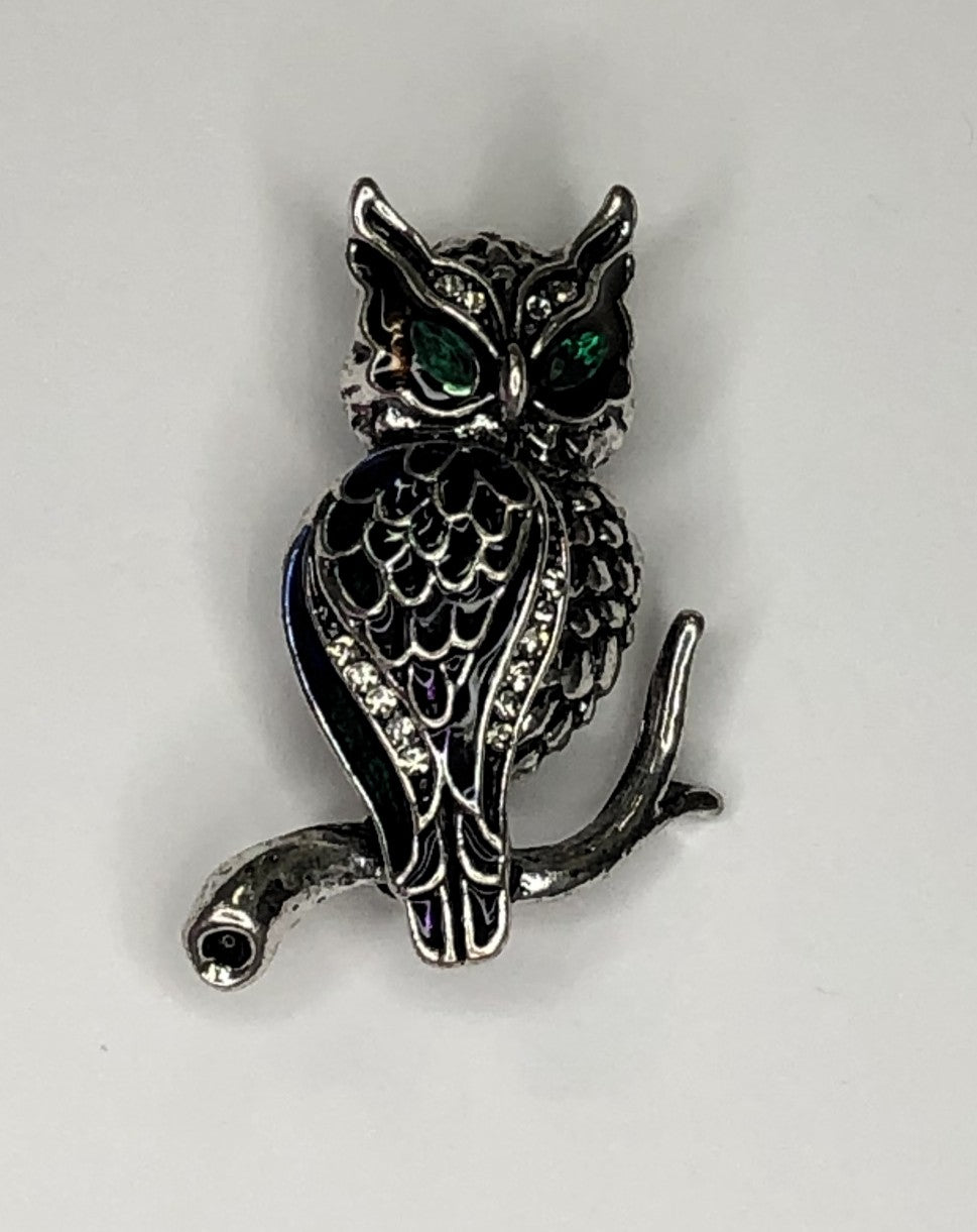Silver owl with coloured enamel wing and green eyes brooch at erika