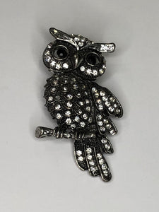Large silver diamante owl sitting on branch brooch at erika