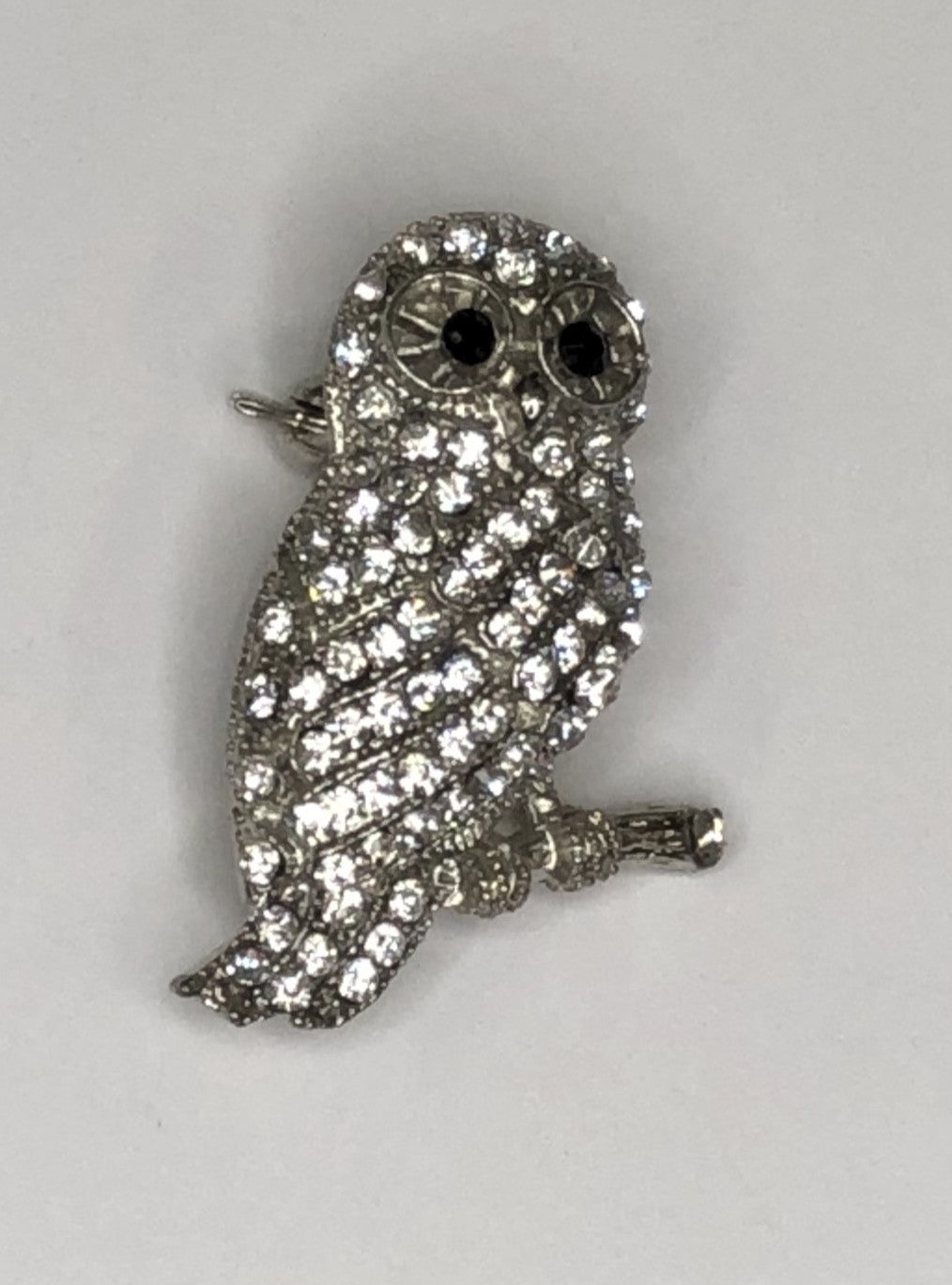 Silver diamante owl perched on branch brooch  at erika