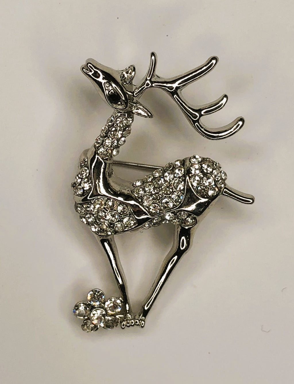 Silver standing reindeer with diamante body brooch at erika