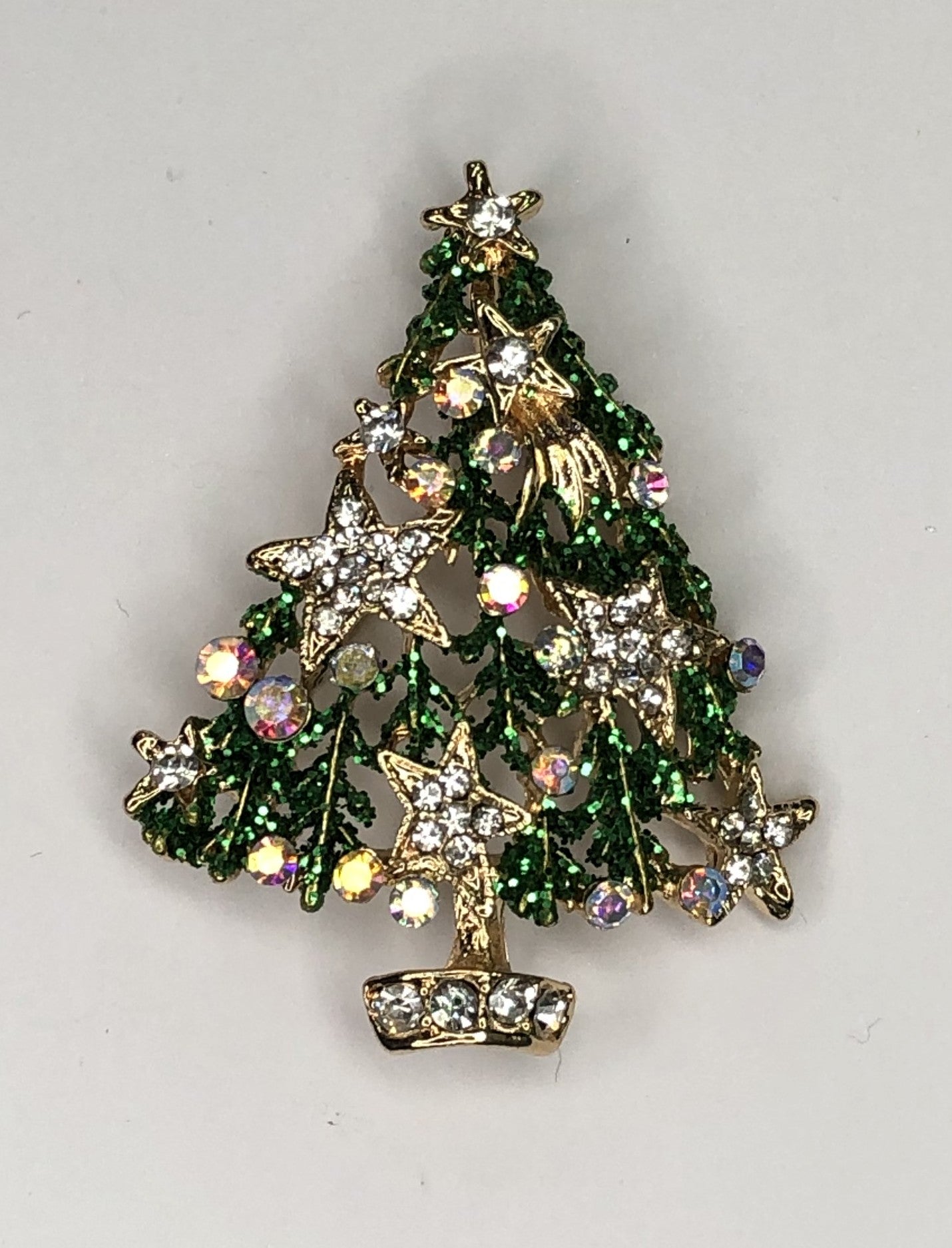Green Christmas tree with gold stars brooch at erika