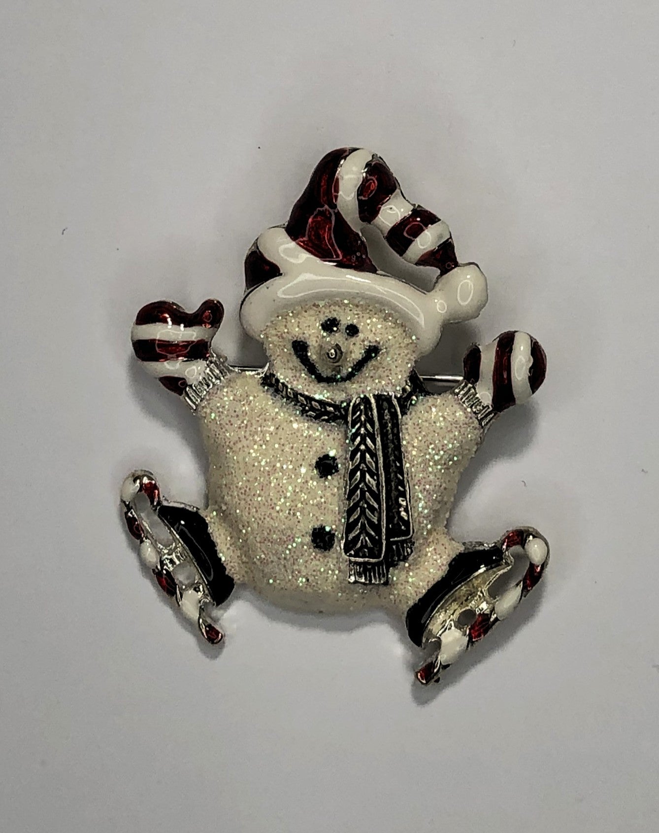 Ice skating snowman with mittens brooch at erika