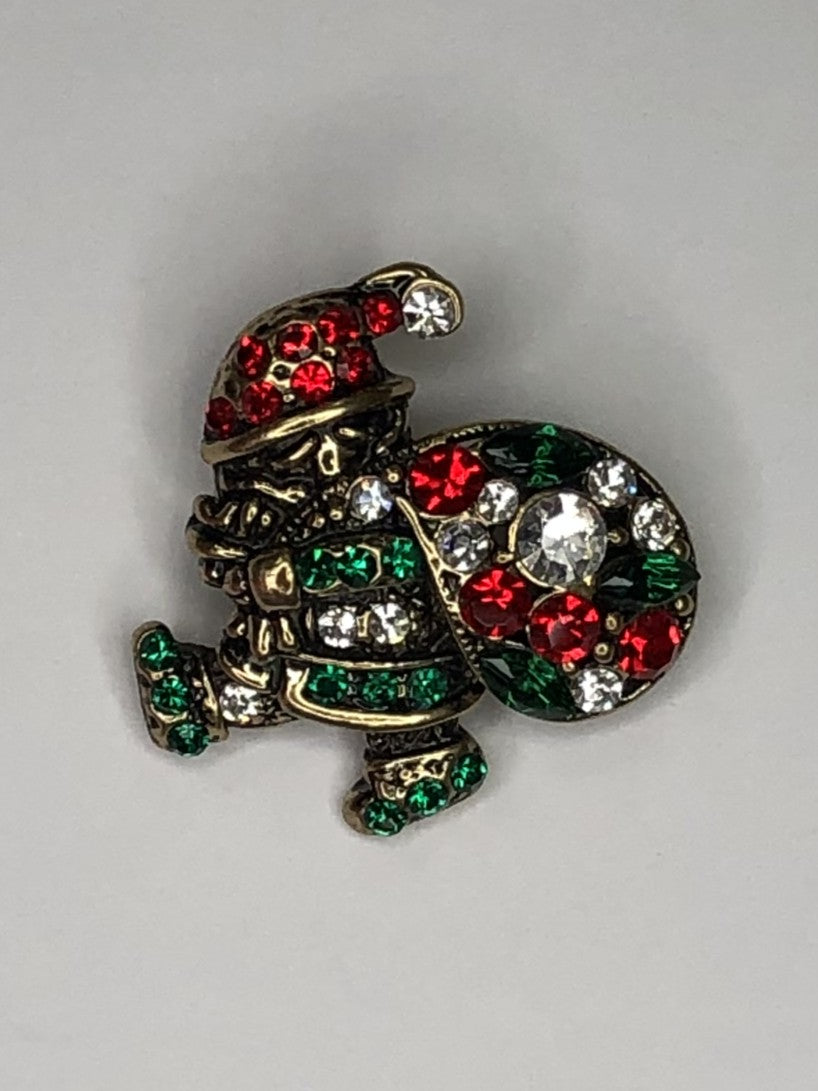 Small Santa carrying sack brooch at erika