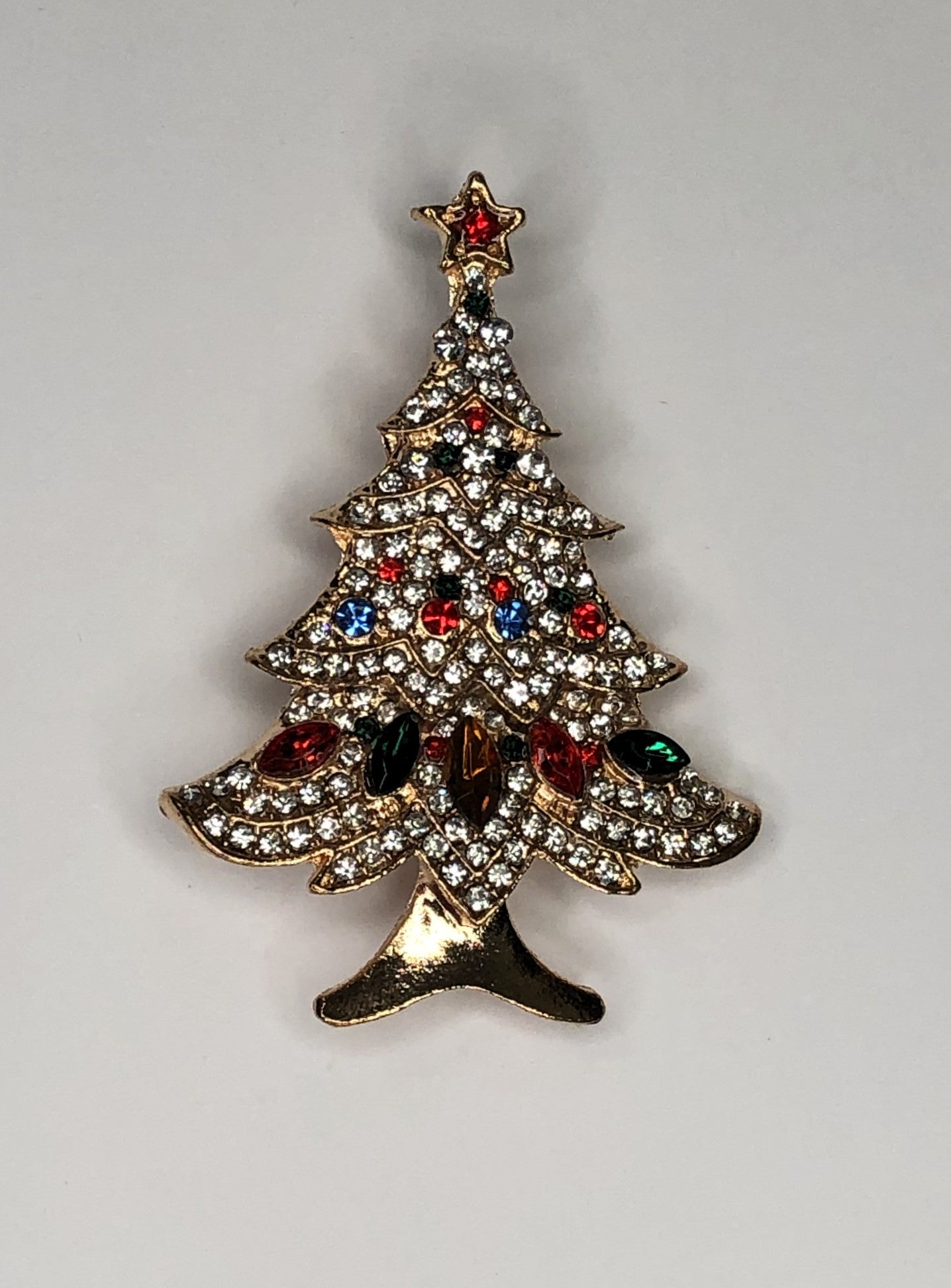 Gold decorated Christmas tree brooch at erika