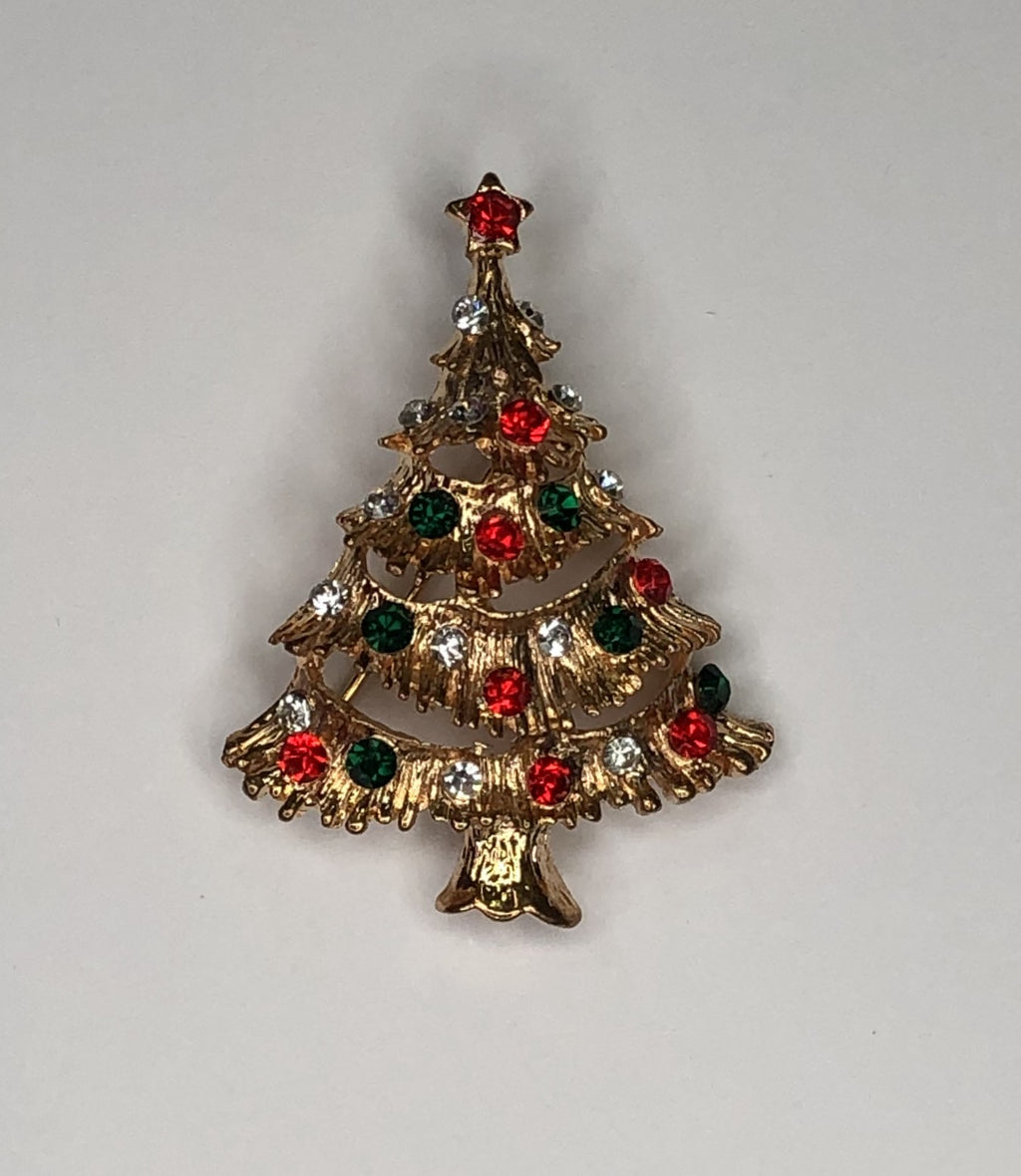 Gold Christmas tree with red star brooch at erika