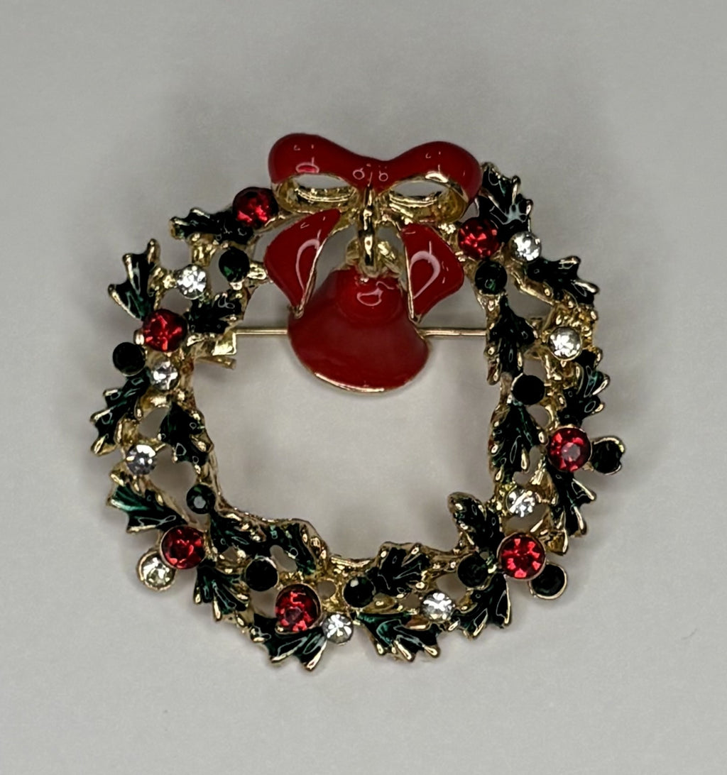 Christmas wreath with red bell brooch at erika