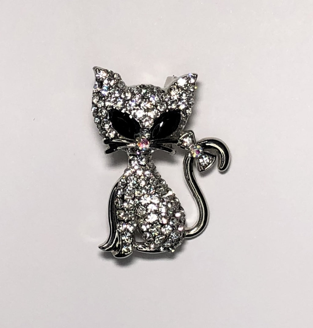 Silver diamante cat with bow on tail brooch at erika