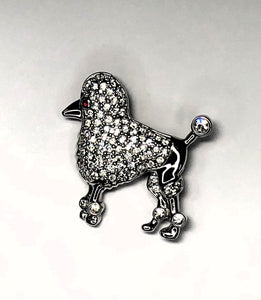 All silver and diamante poodle dog with red crystal eye brooch with continental clip at erika