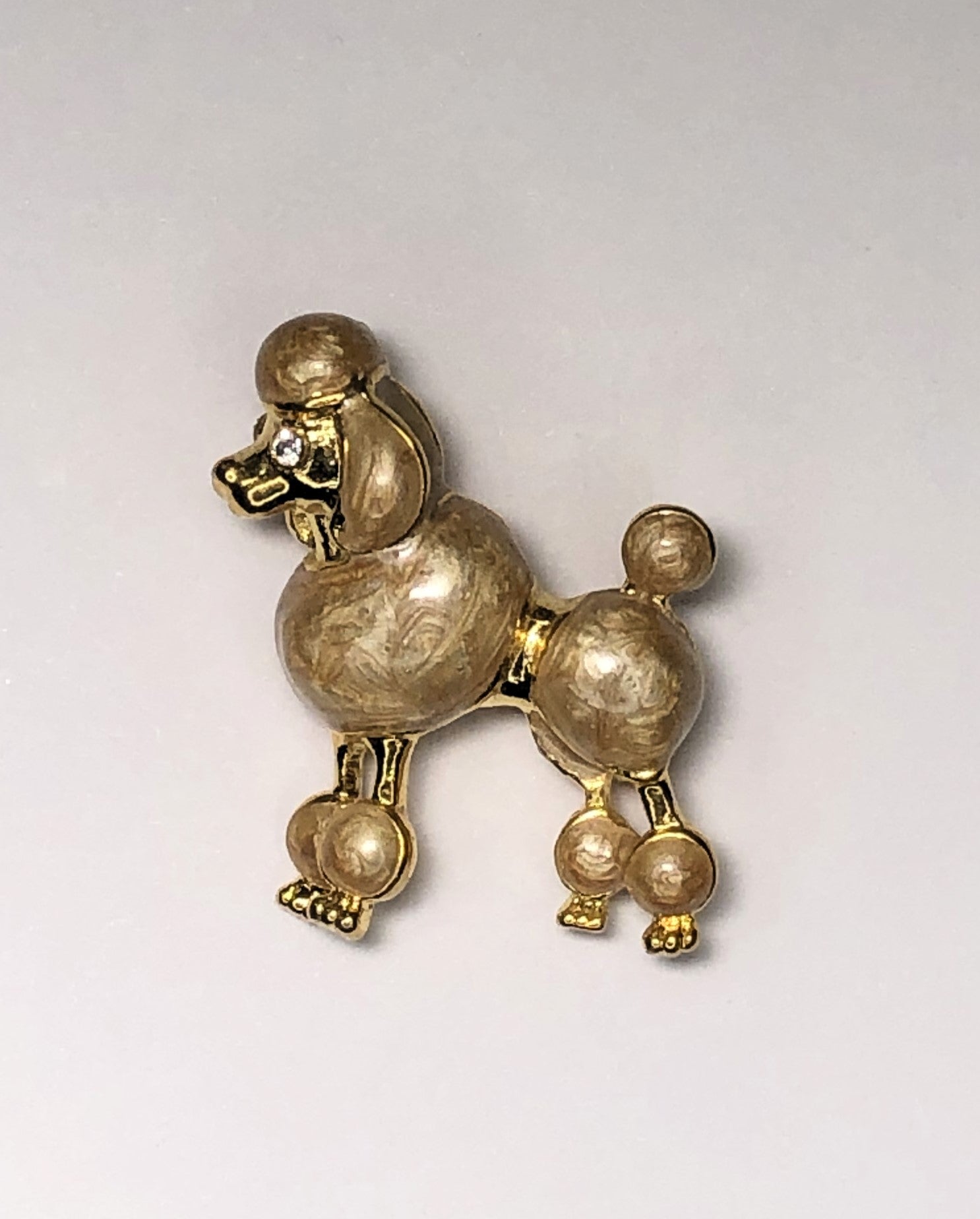 Gold and cream enameled poodle dog with diamante eyes brooch at erika