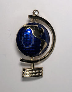 World globe in blue and gold brooch at erika