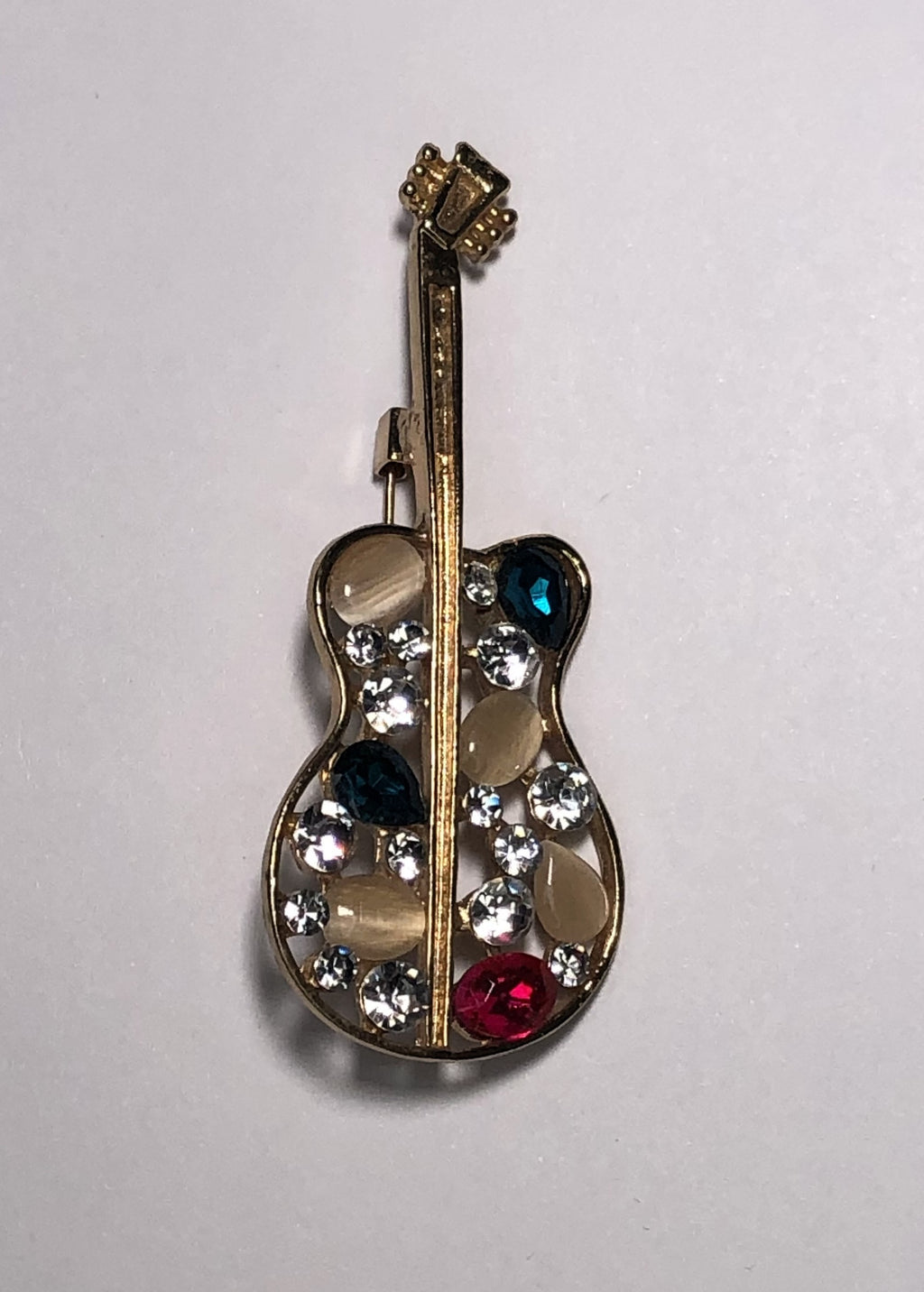 Gold guitar bejewelled body brooch at erika