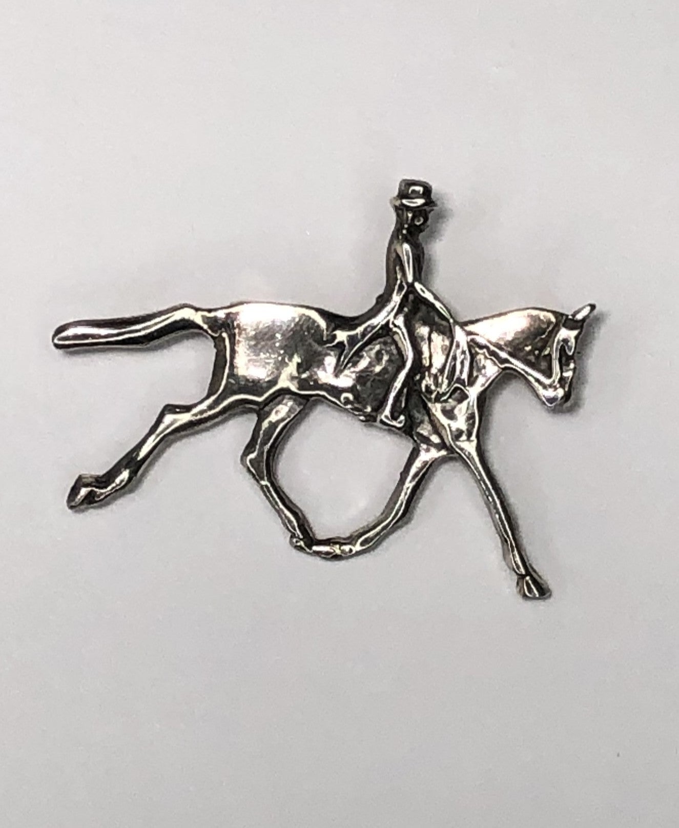 Equestrian rider on horse sterling silver brooch at erika