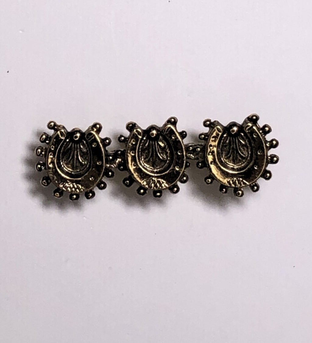 Gold lucky horse shoes brooch at erika