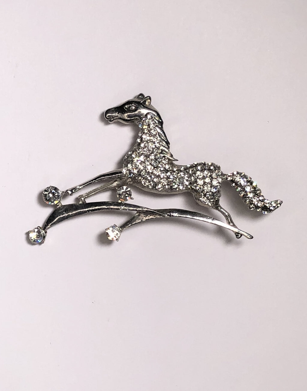 Galloping silver diamante horse brooch at erika