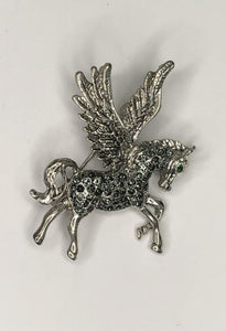 Silver diamante Pegasus with green eye brooch at erika