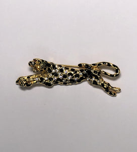 Leaping black and gold leopard with diamante spots brooch at erika