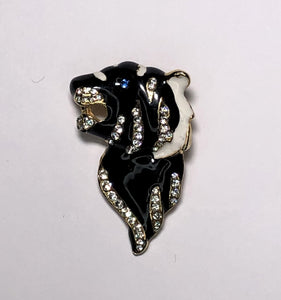 Black enameled lion head with gold diamante brooch at erika