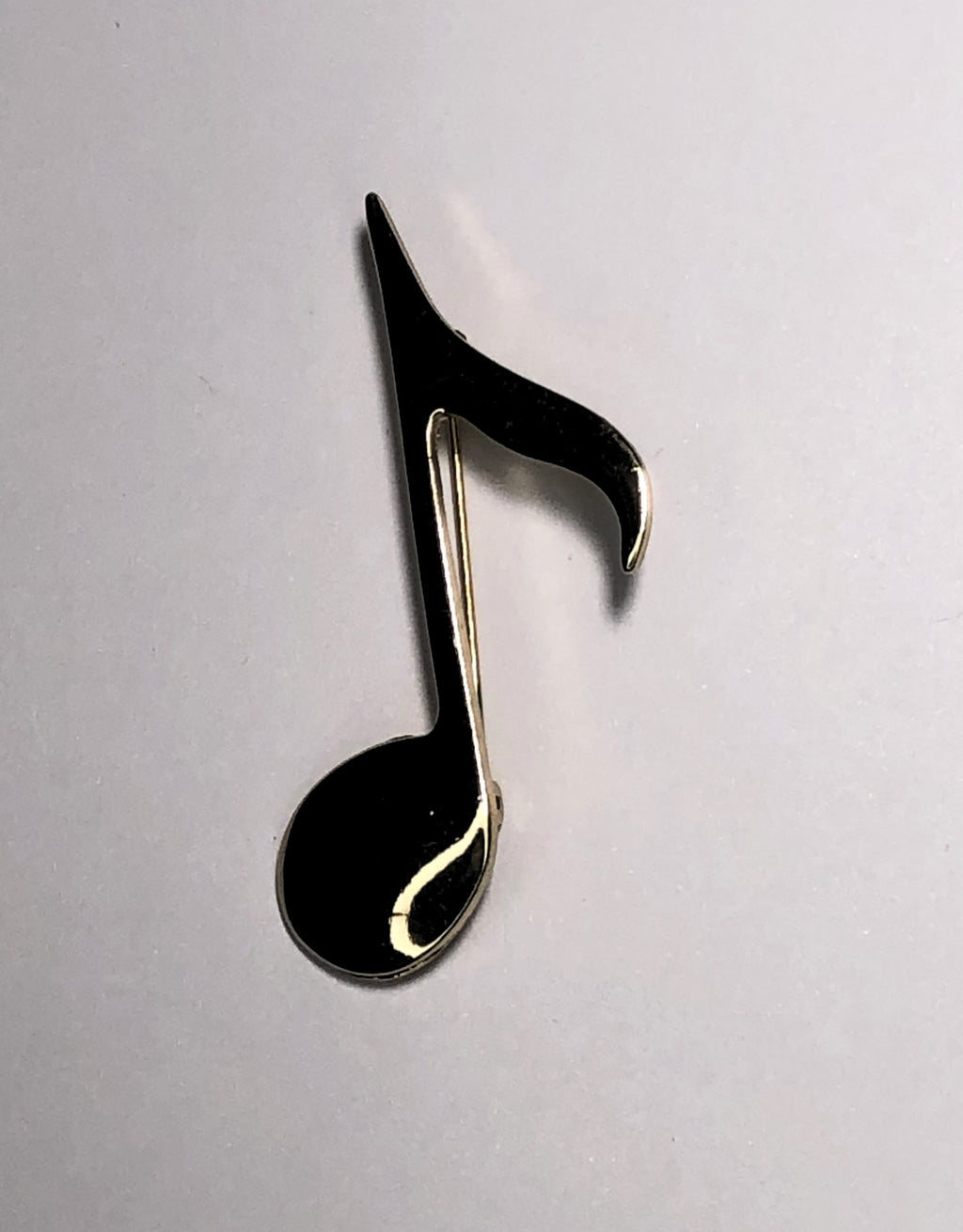 Gold quaver musical note brooch at erika