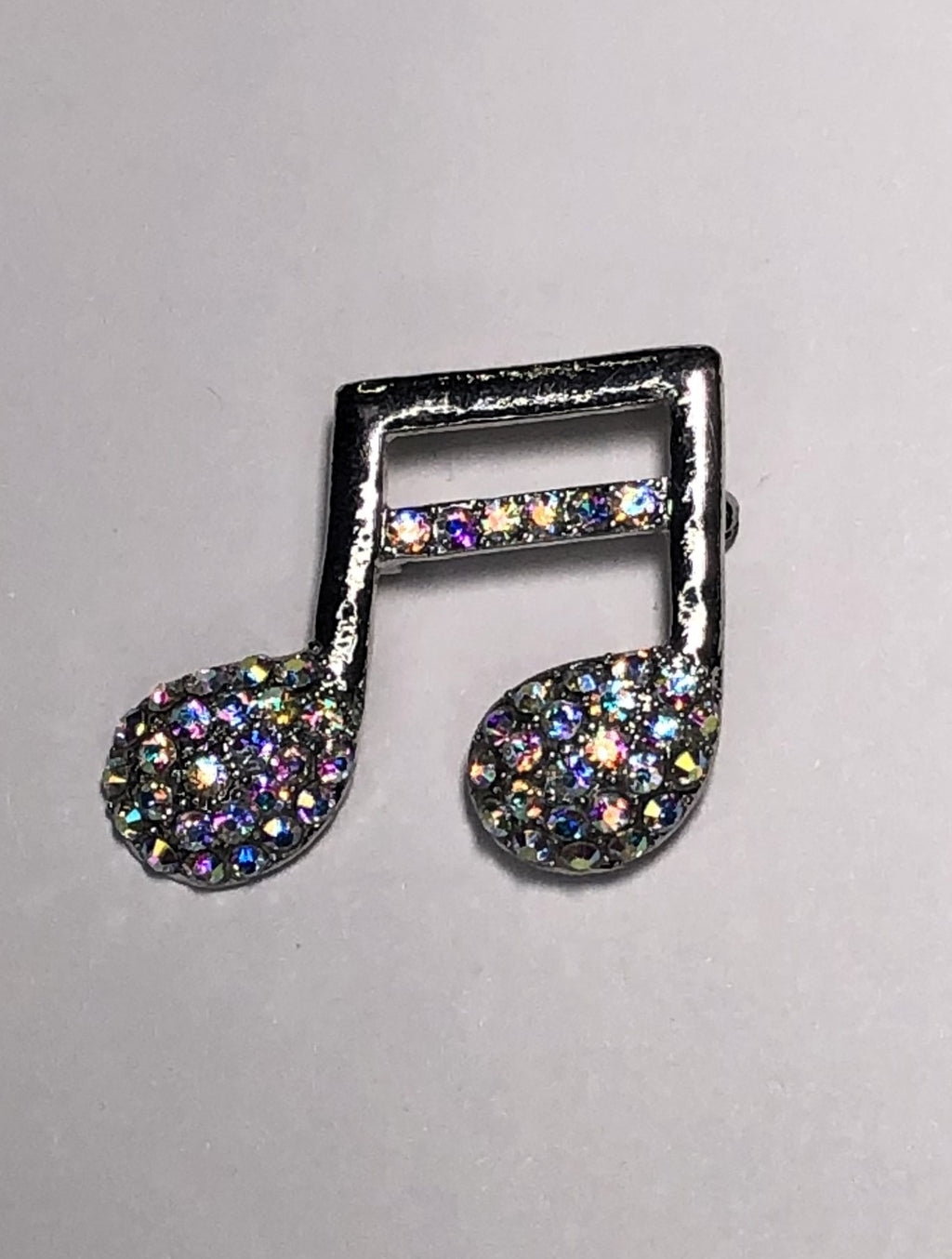 Silver diamante quaver musical note brooch at erika