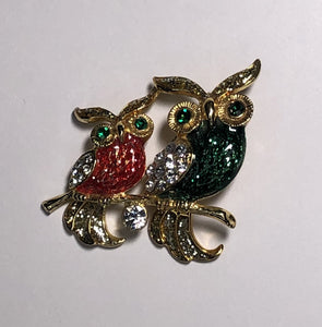 Two enameled and diamante owls with swinging tails brooch at erika