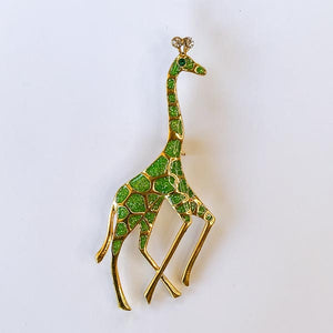 green and gold giraffe brooch