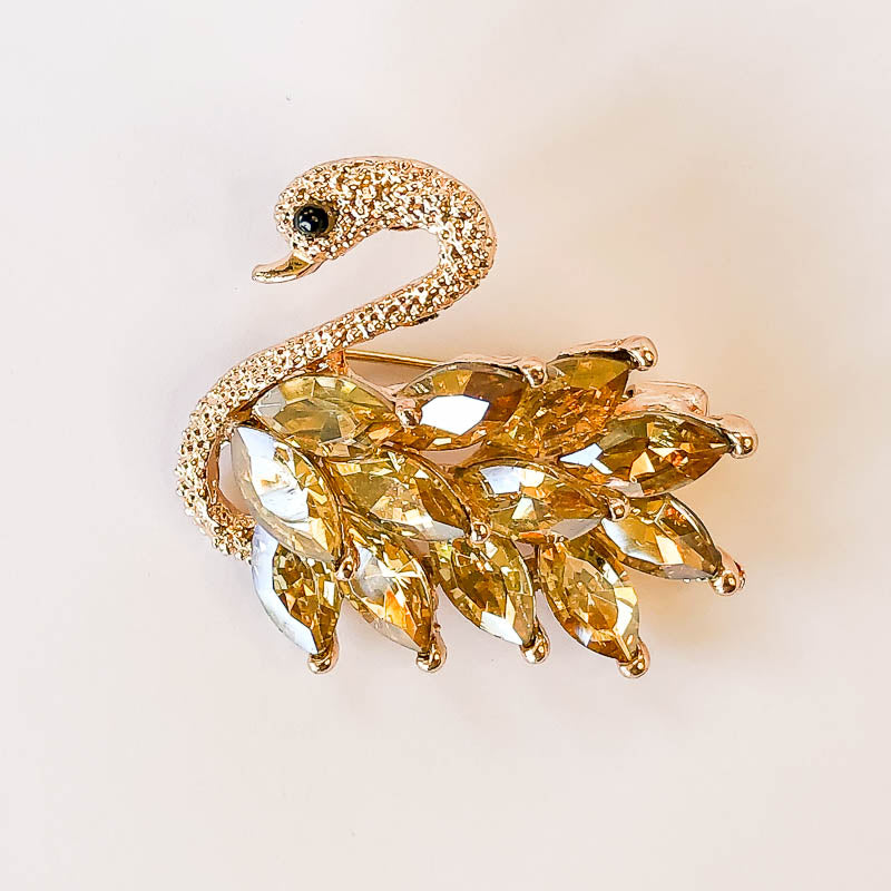gold swan with topaz crystals brooch