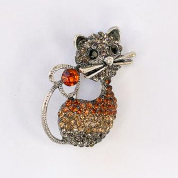 silver cat with topaz crystals and black diamante eyes brooch at erika