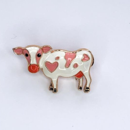 white and pink jersey cow brooch