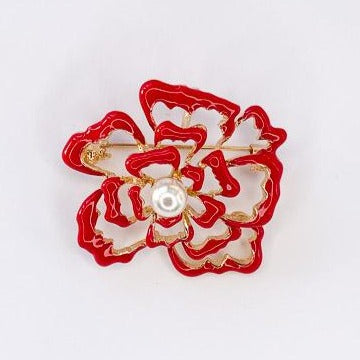 red enamel flower with pearl centre brooch at erika