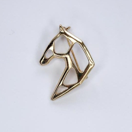 gold abstract horse head brooch