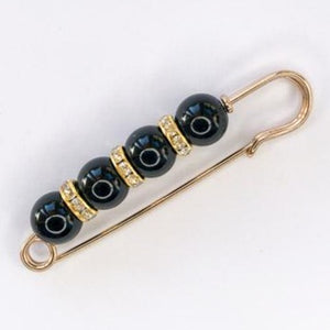 gold and diamante kilt pin with black beads at erika