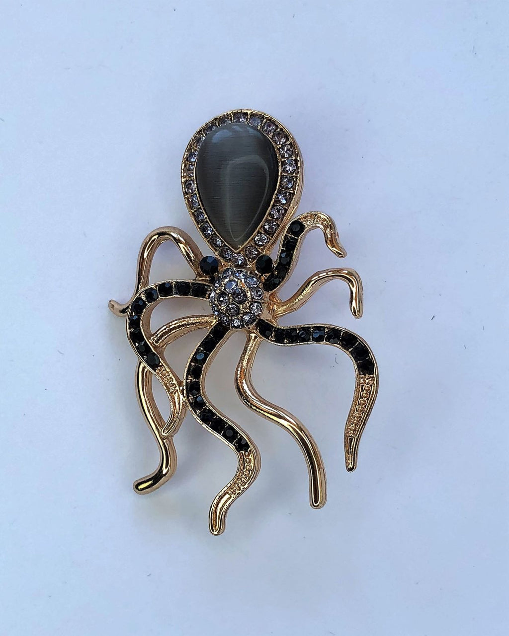 Gold, black & grey crystal octopus brooch at erika