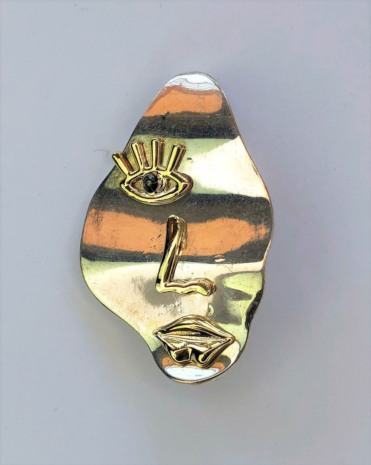 Picasso style face silver & gold brooch at erika