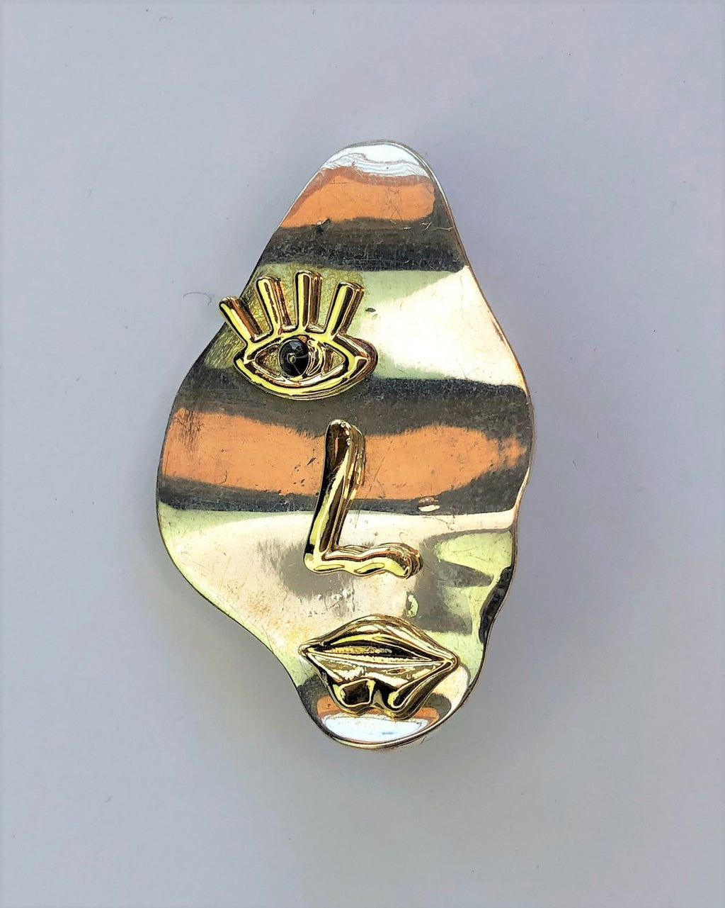 Picasso style face silver & gold brooch at erika