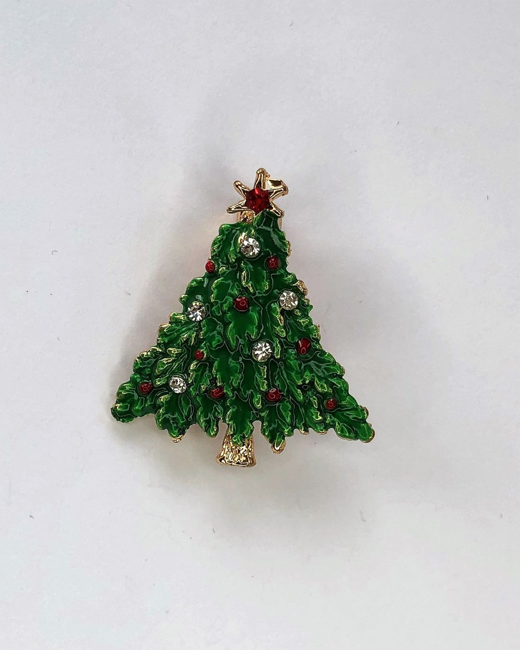 Green enamelled decorated Christmas tree brooch at erika
